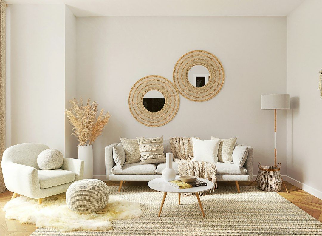A living room filled with furniture and a mirror
